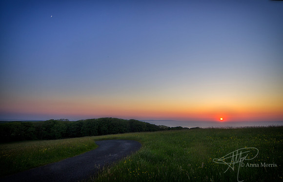 Moon chasing the Irish Sunset
